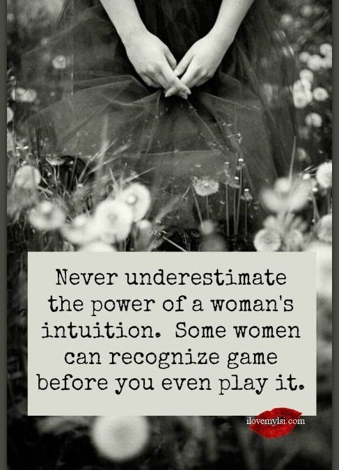 Woman seated on flowers see her hands with quote: Never Underestimate the power of a woman's intuition. Some women can recognize game before you even play it.